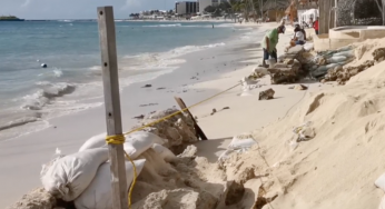 Denuncian construcción de barda en un club de playa